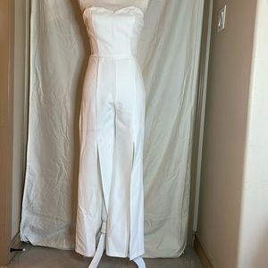 White jumpsuit. Strapless open leg jumpsuit.
